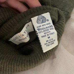 100% Marino wool turtleneck. Made in Italy.